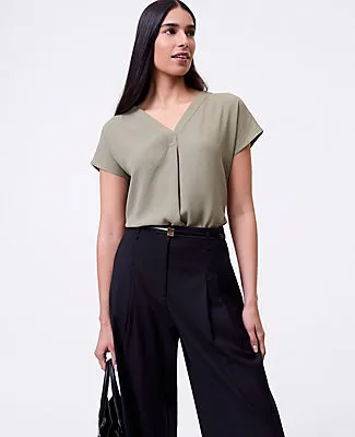 Ann Taylor Mixed Media Pleat Front Top sold by Ann Taylor