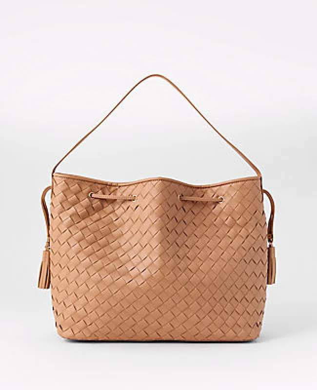 Ann Taylor Cinched Tassel Woven Tote sold by Ann Taylor