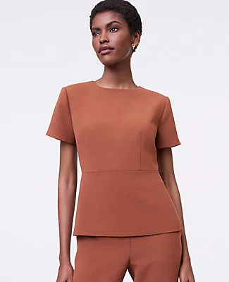 Ann Taylor The Crew Neck Peplum Top in Textured Crepe sold by Ann Taylor