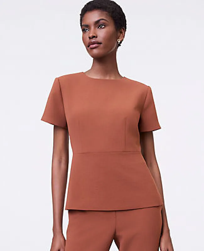Ann Taylor The Petite Crew Neck Peplum Top in Textured Crepe sold by Ann Taylor