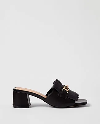 Ann Taylor Leather Kiltie Block Heel Sandal sold by Ann Taylor