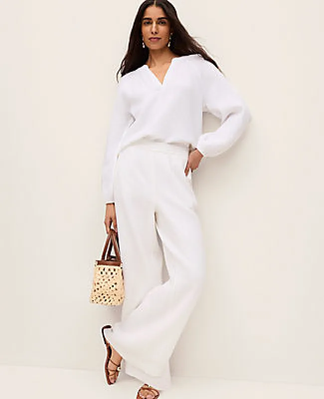 Ann Taylor The Petite Pull-On Wide-Leg Pant in Triple Cloth sold by Ann Taylor