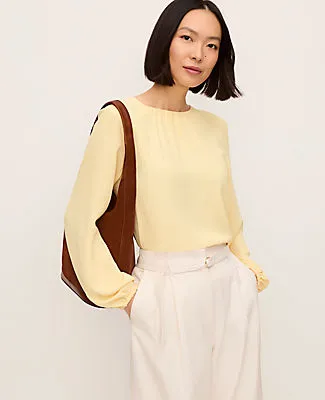 Ann Taylor Pleated Front Mixed Media Blouse sold by Ann Taylor