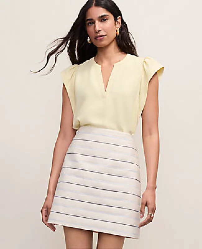 Ann Taylor Petite Mixed Media Flutter Sleeve Top made by Ann Taylor