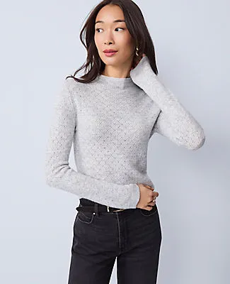 Ann Taylor Pointelle Mock Neck Sweater sold by Ann Taylor