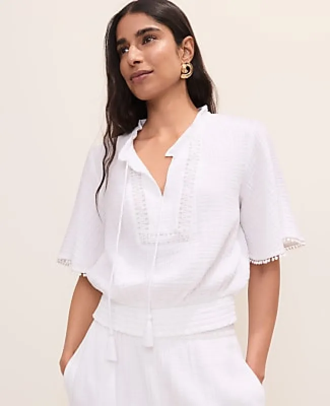 Ann Taylor Petite Smocked Bobble Trim Blouse made by Ann Taylor