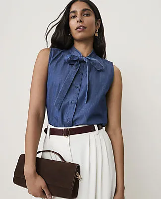 Ann Taylor Sleeveless Bow Neck Blouse in Chambray sold by Ann Taylor
