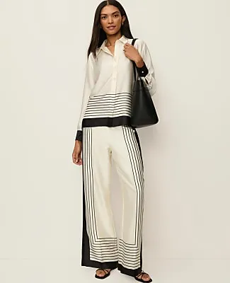 Ann Taylor The Petite Pleated Satin Wide-Leg Pant sold by Ann Taylor