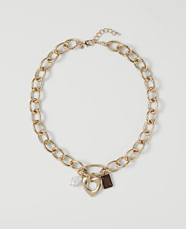 Ann Taylor Heart Charm Necklace made by Ann Taylor