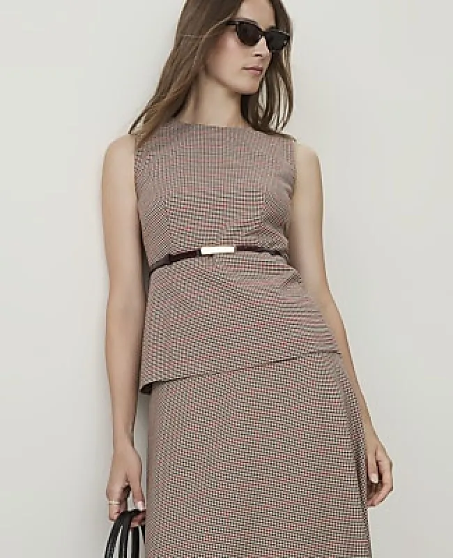 Ann Taylor Petite Houndstooth Crew Neck Peplum Top made by Ann Taylor