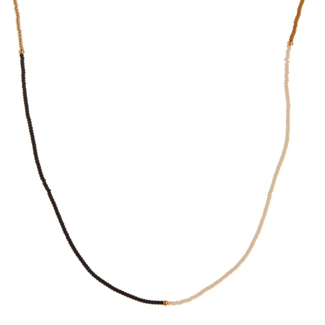 White, Black, Dark Yellow, and Gold Beaded Necklace sold by Anna Beck
