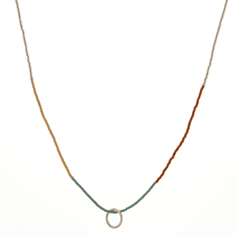 Turquoise, Tan, Brown, and Silver Beaded Necklace sold by Anna Beck