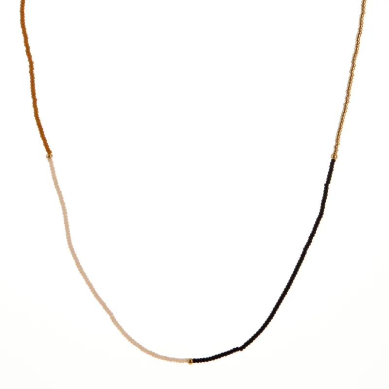 White, Dark Yellow, Black, and Gold Beaded Necklace sold by Anna Beck