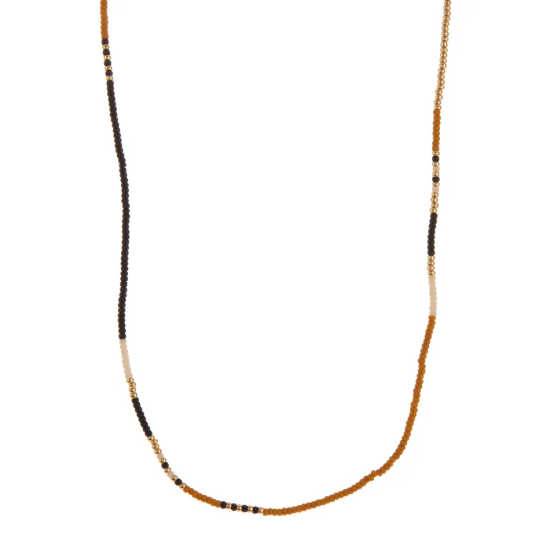 Dark Yellow, White, Gold, and Black Beaded Necklace sold by Anna Beck