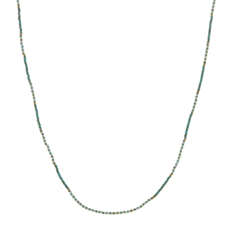 Tuquoise, Ivory, and Gold Beaded Necklace sold by Anna Beck
