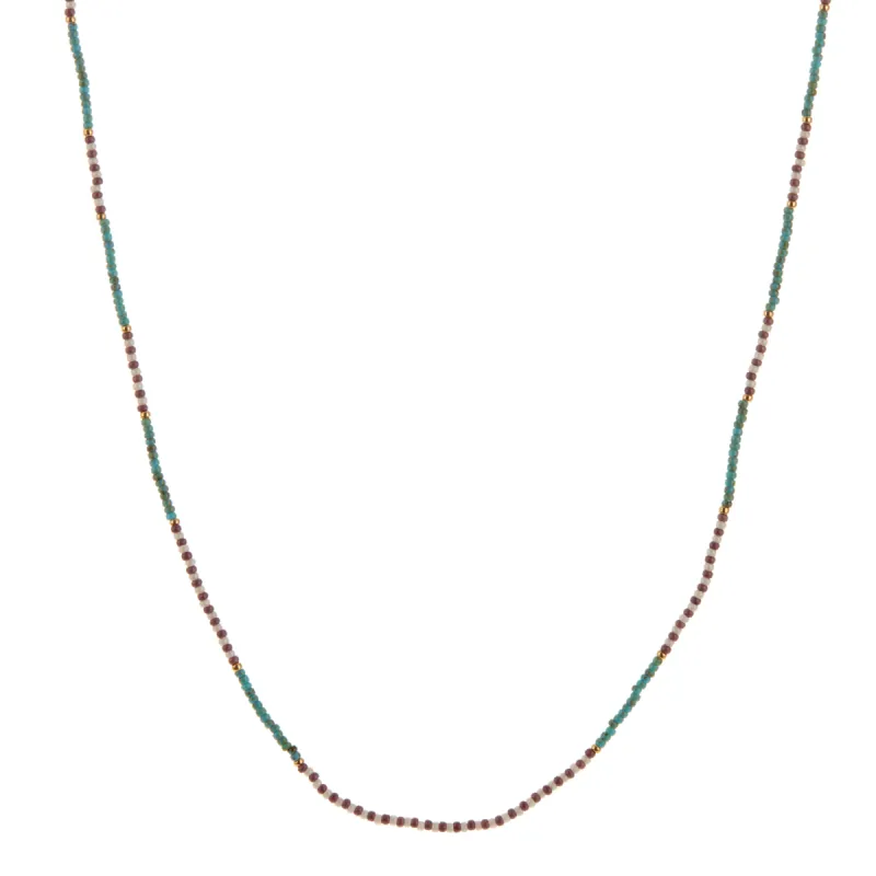 Turquoise, Purple, White, and Gold Beaded Necklace sold by Anna Beck