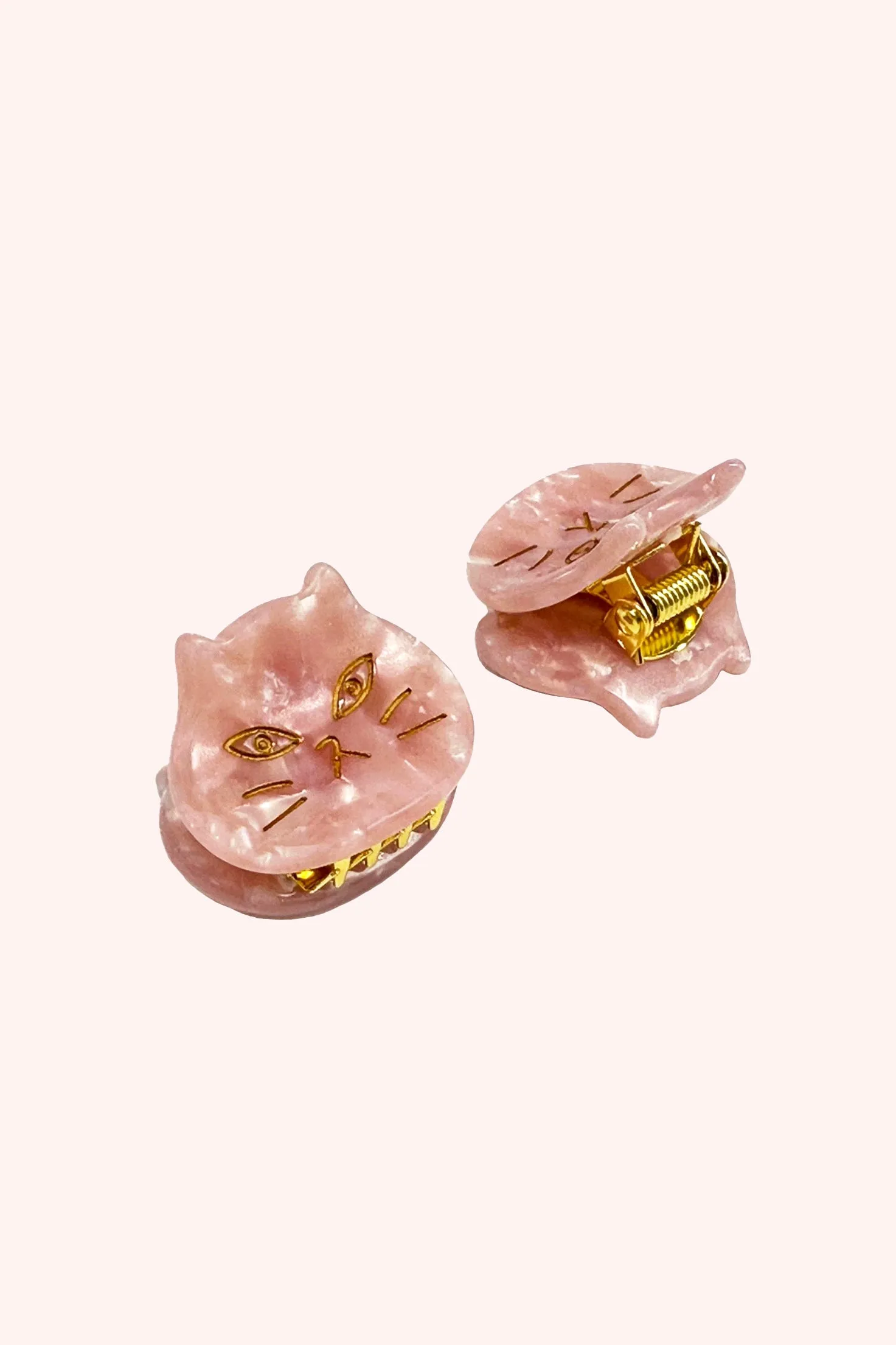 The Cat's Meow Jaw Clip Pair Pink sold by Anna Sui