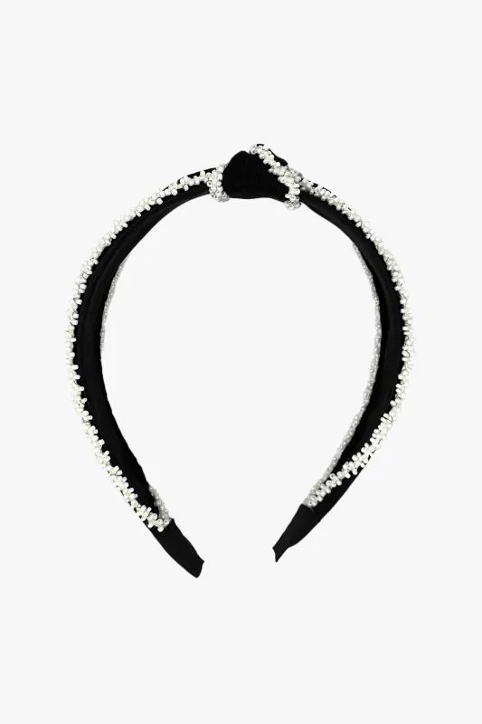 Pearl Knot Headband sold by Anna Sui
