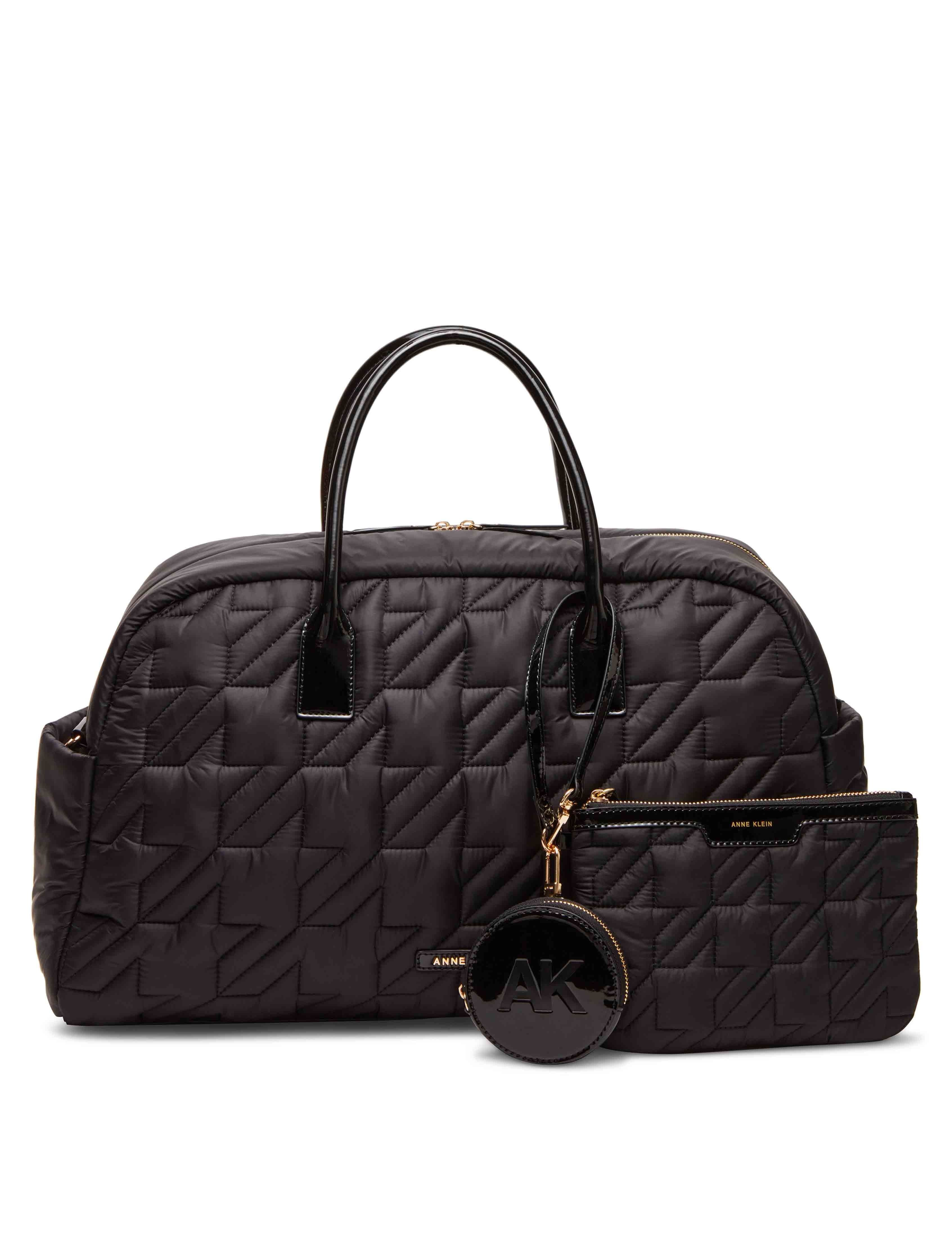 Quilted Nylon Weekender With Pouch And Web Strap sold by Anne Klein
