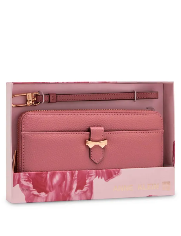 AK Boxed Slim Zip Wallet With Bow Detailing And Wristlet Strap sold by Anne Klein