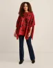 Floral Sequin Poncho sold by Anne Klein