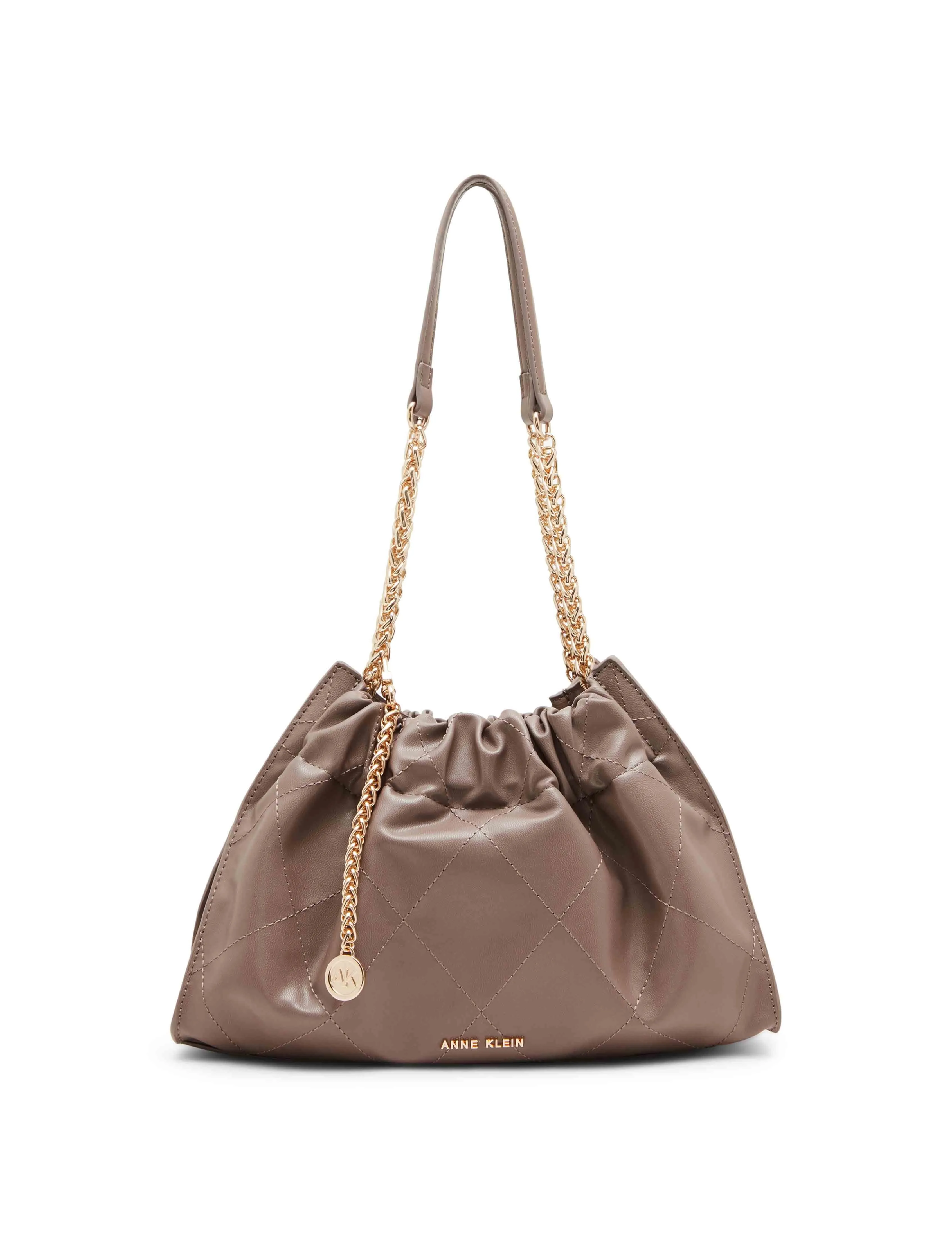 Quilted stitched Cinched closure satchel sold by Anne Klein