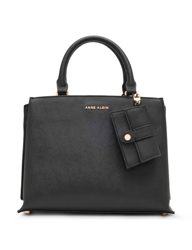 Curve structured satchel with convertible strap sold by Anne Klein