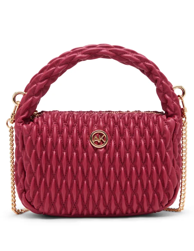 Rounded mini ruched crossbody sold by Anne Klein