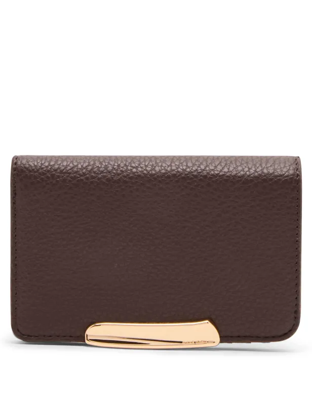 Small Sculpted Plaque Bifold Wallet sold by Anne Klein