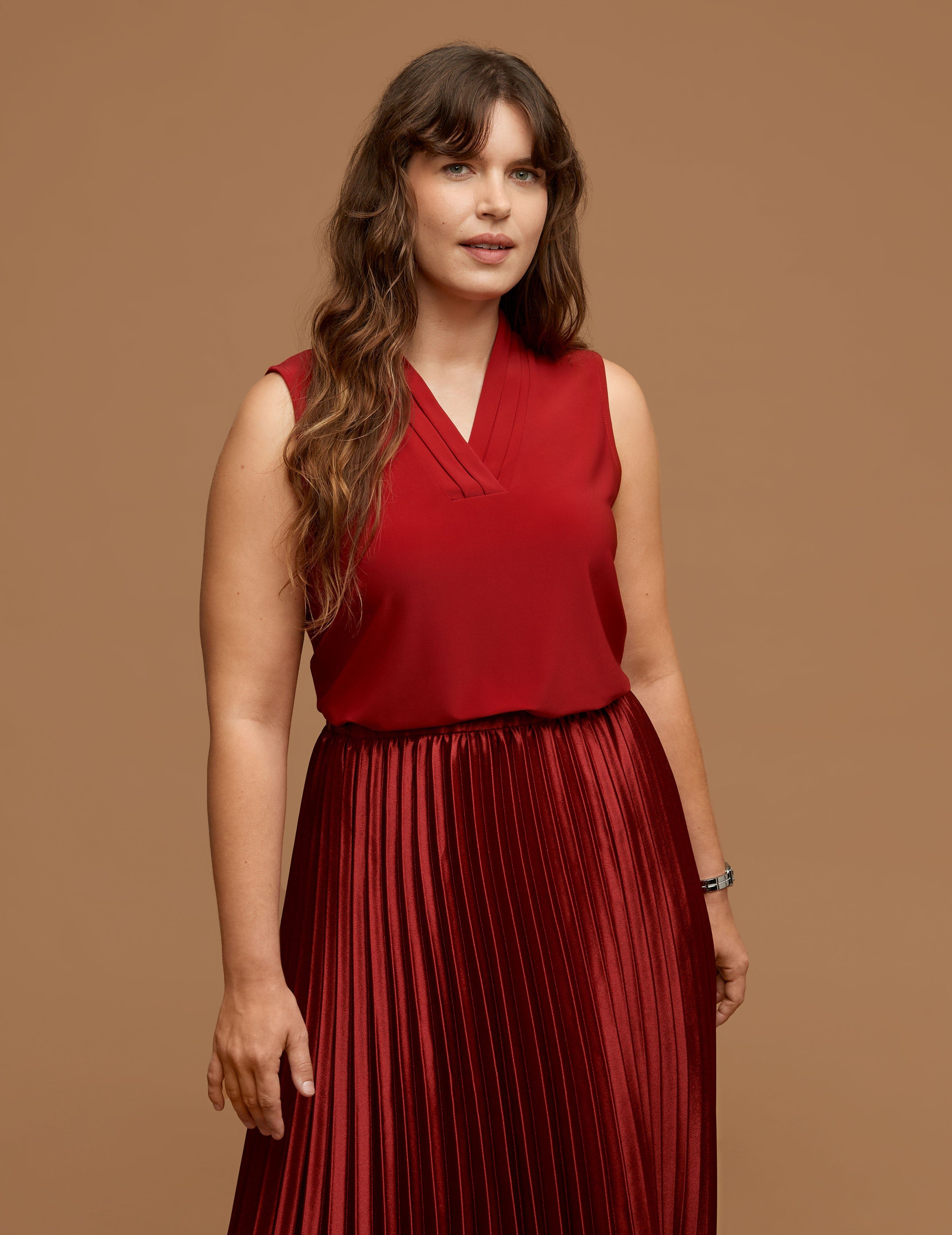 Plus Size Solid Triple Pleat Top sold by Anne Klein