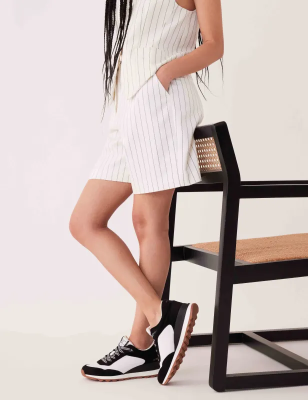 Restless Sneaker sold by Anne Klein