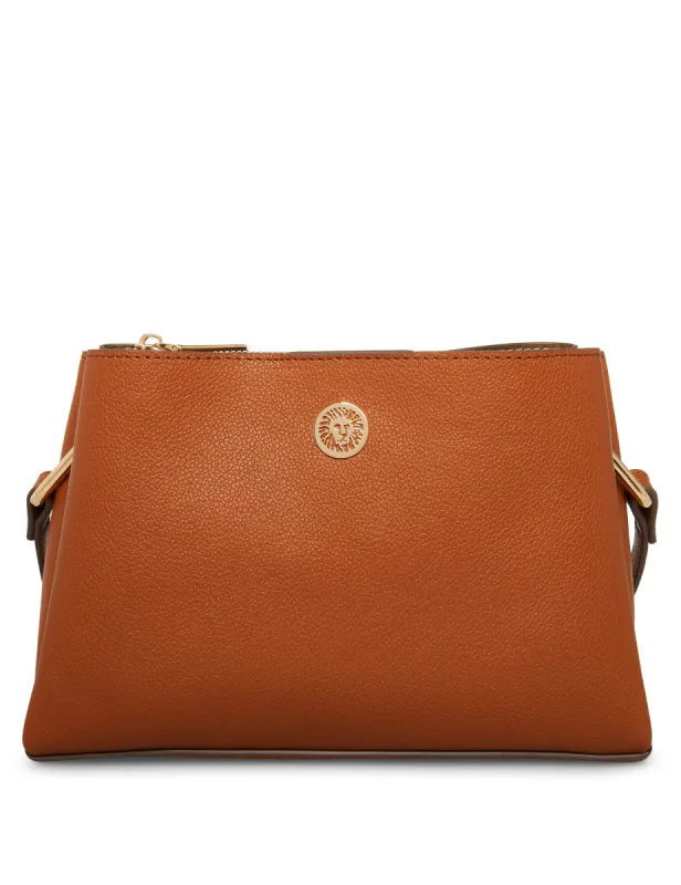 A Hinge Triple Compartment Crossbody sold by Anne Klein