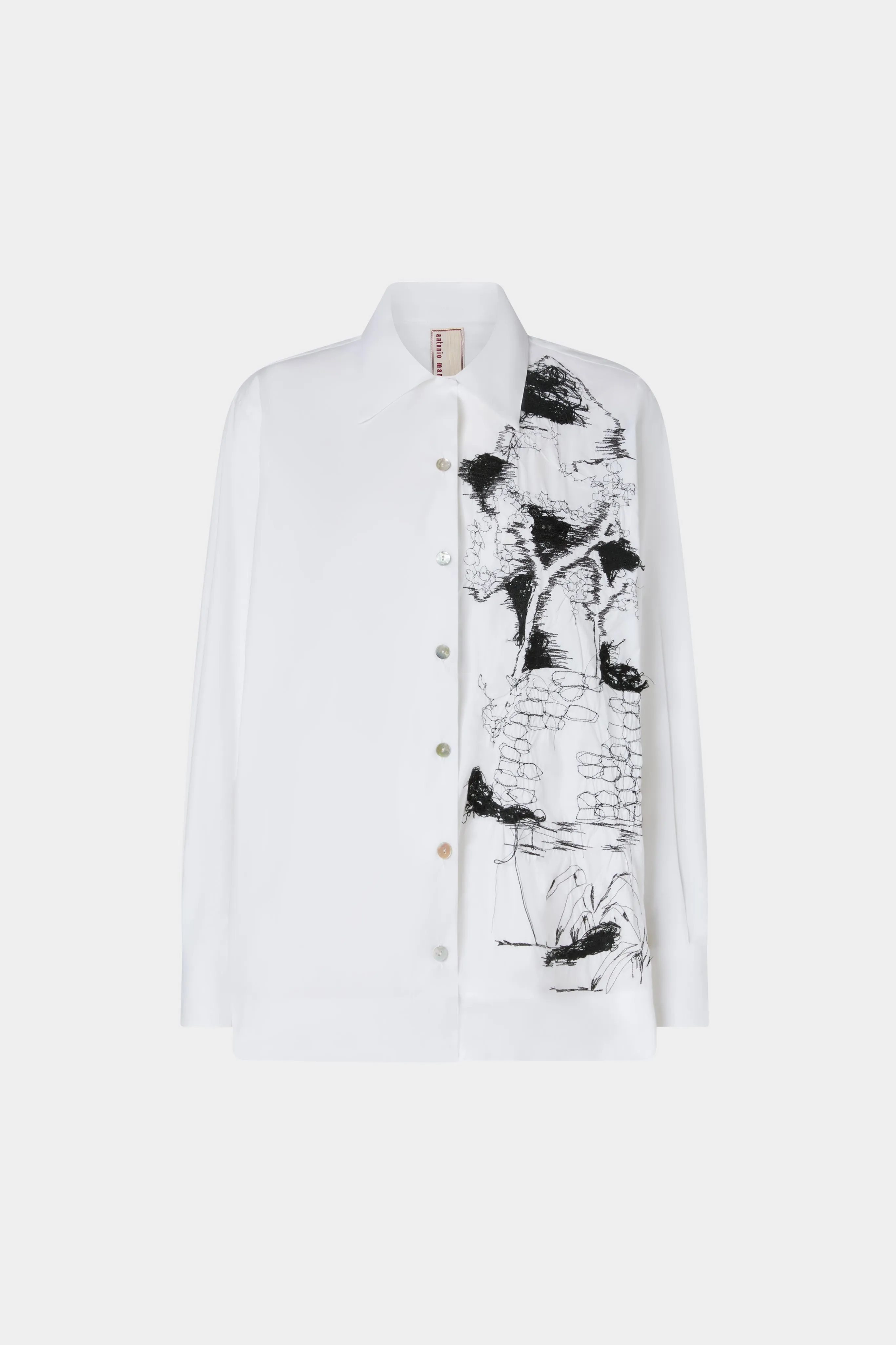 White Shirt Black Embroideries sold by Antonio Marras