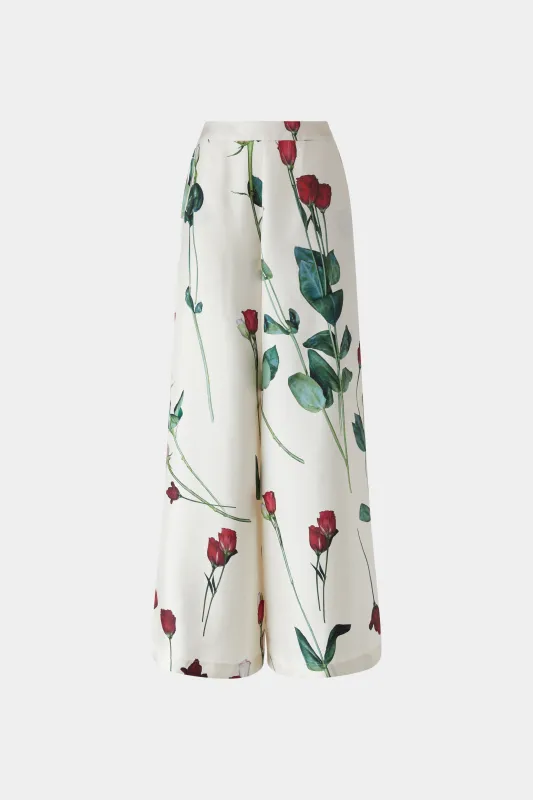 Ivory Silk Pants with Floral Print sold by Antonio Marras