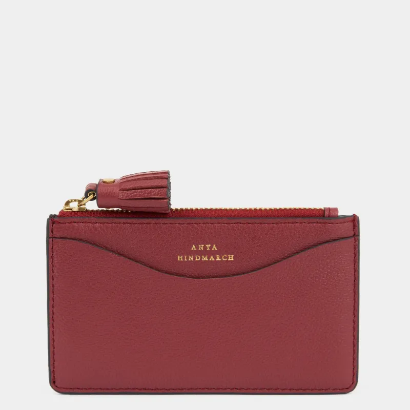Peeping Eyes Zip Card Case sold by Anya Hindmarch