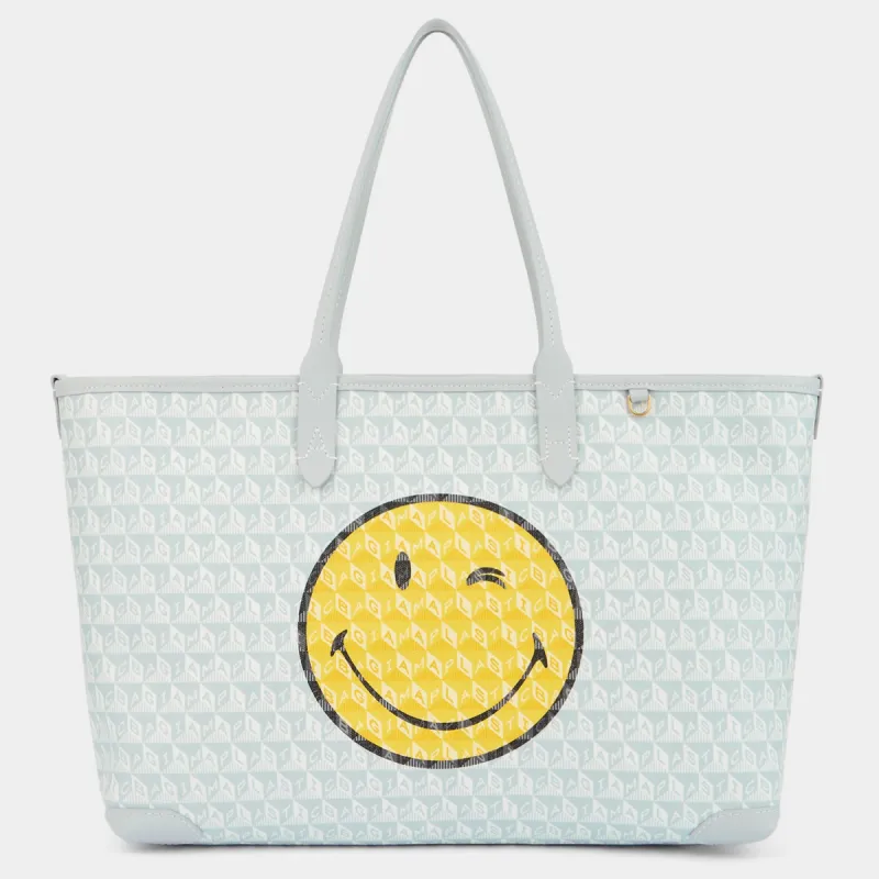 I Am A Plastic Bag Wink Zipped Tote sold by Anya Hindmarch