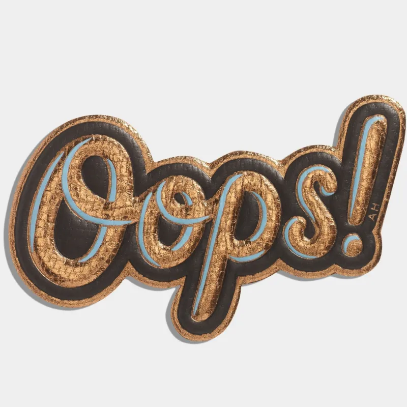 OOPS! Sticker sold by Anya Hindmarch