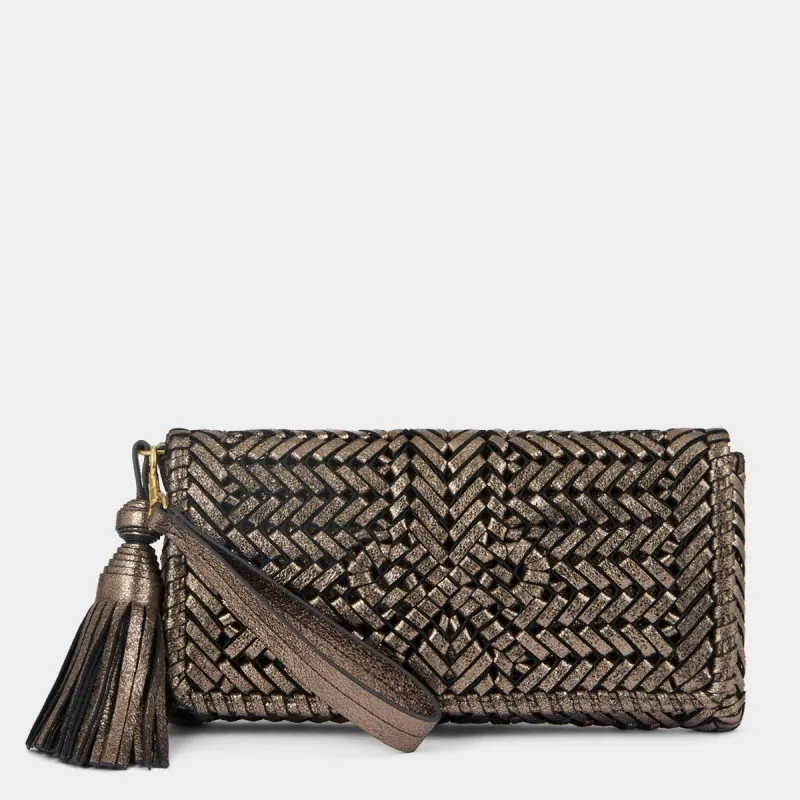 Neeson Tassel Clutch sold by Anya Hindmarch