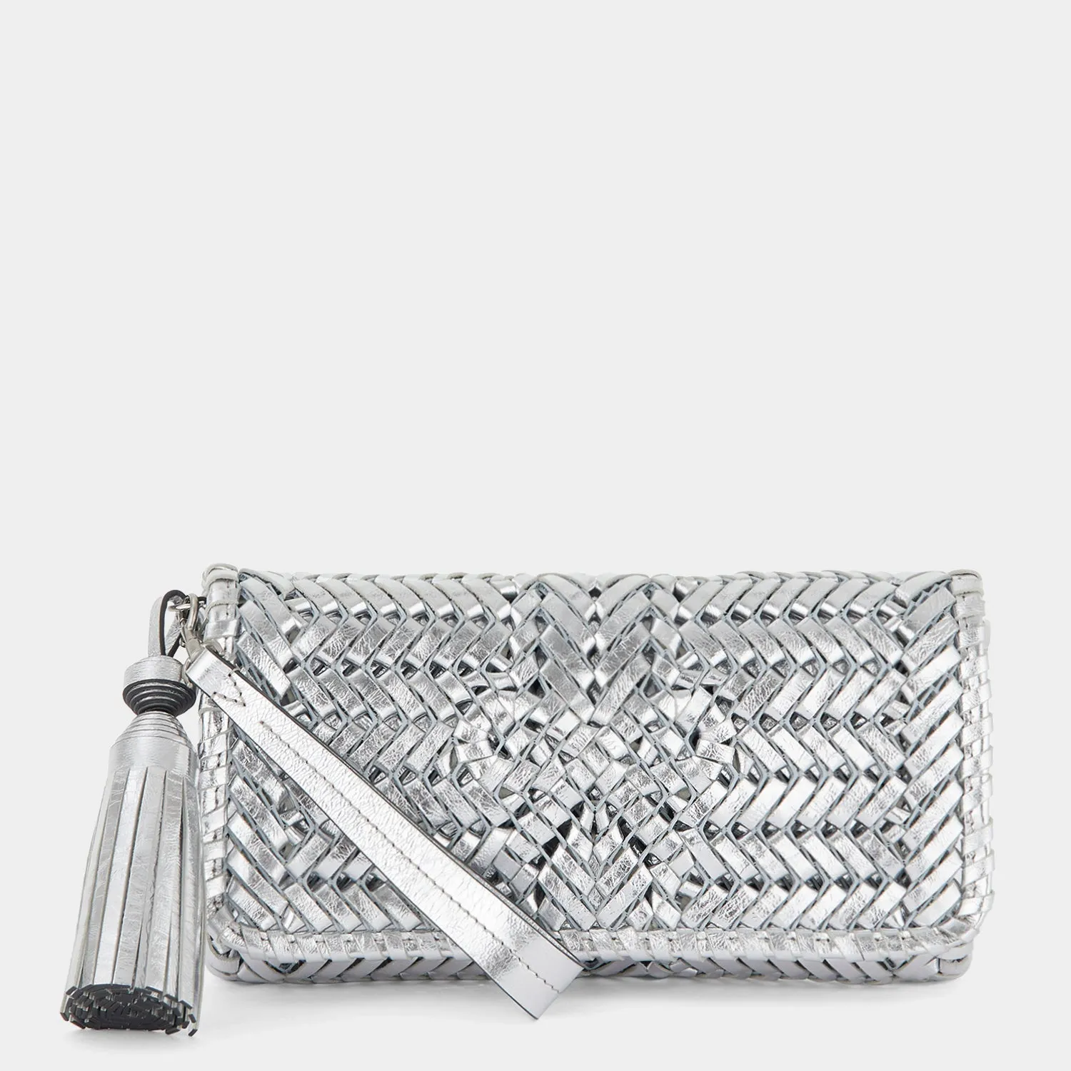 Neeson Tassel Clutch sold by Anya Hindmarch
