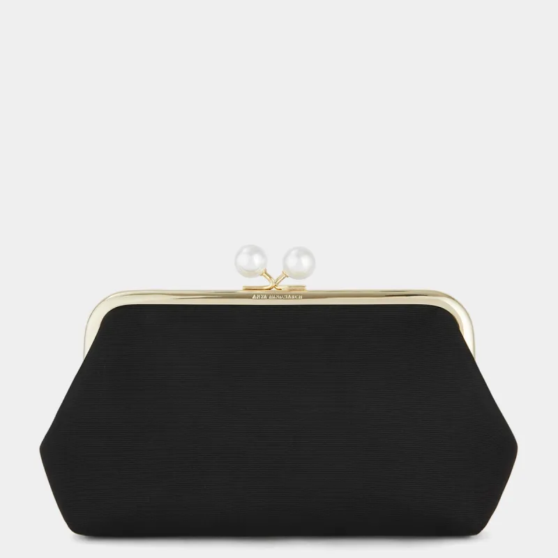 Maud Pearls Clutch sold by Anya Hindmarch