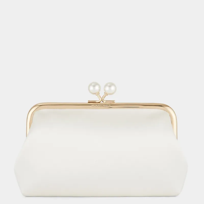 Maud Pearls Clutch sold by Anya Hindmarch