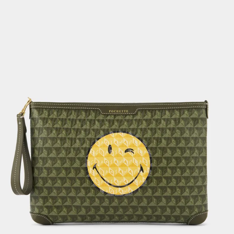 I Am A Plastic Bag Wink Pochette sold by Anya Hindmarch