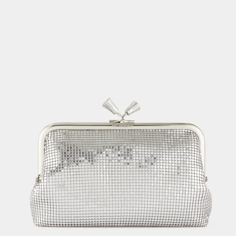 Maud Mesh Tassel Clutch sold by Anya Hindmarch
