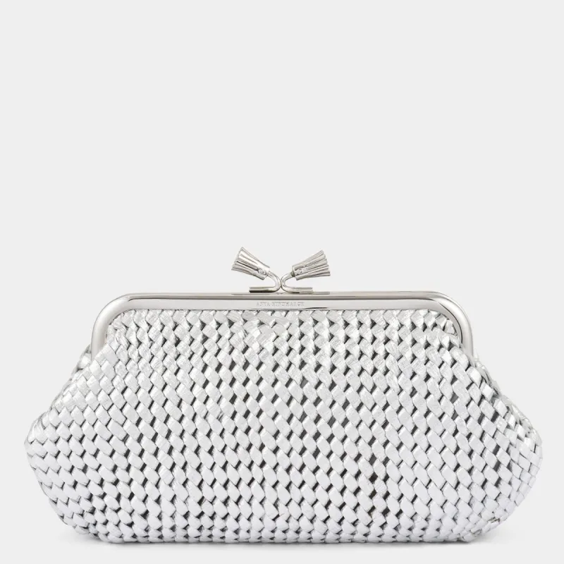 Maud Plaited Tassel Clutch sold by Anya Hindmarch