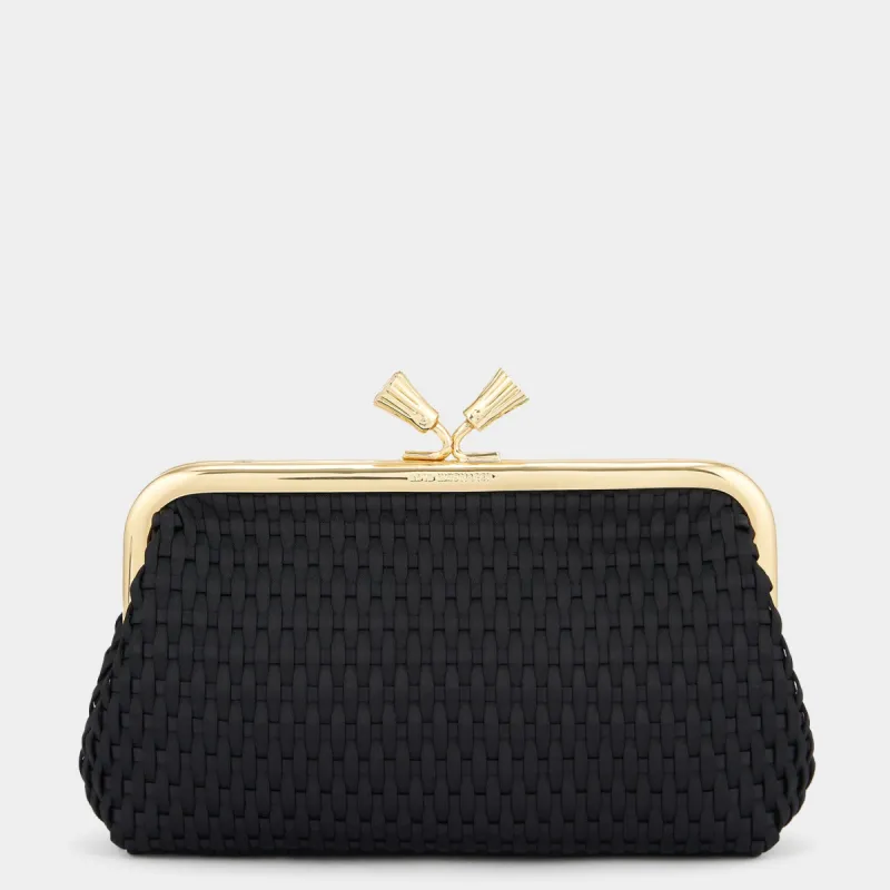 Maud Woven Tassel Clutch sold by Anya Hindmarch