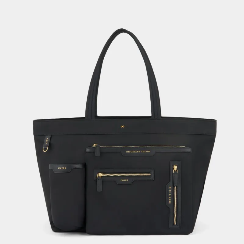 E/W Multi Pocket Tote sold by Anya Hindmarch