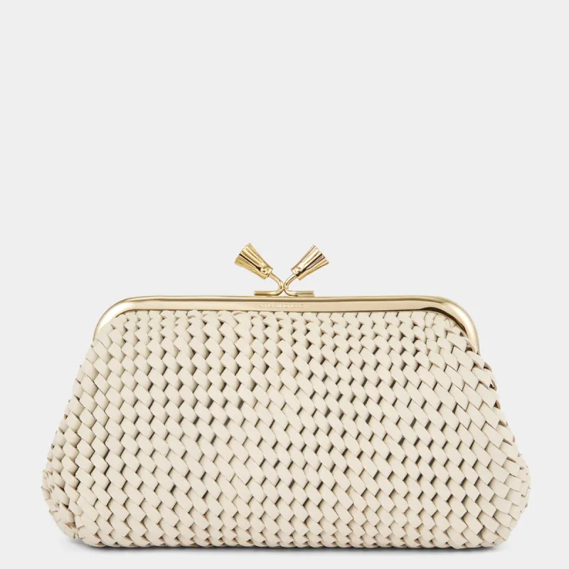 Maud Plaited Tassel Clutch sold by Anya Hindmarch