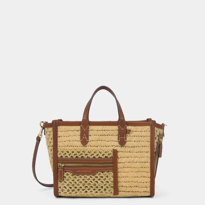 Raffia Pocket XS Cross-body Tote sold by Anya Hindmarch