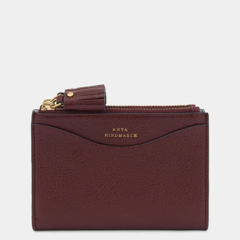 Peeping Eyes Small Double Zip Wallet sold by Anya Hindmarch