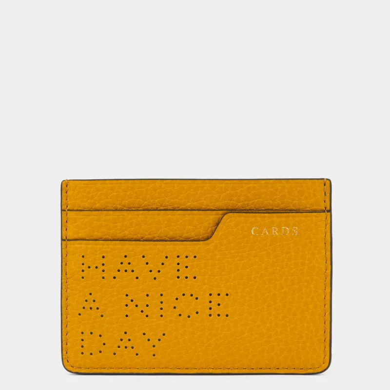 Have a Nice Day Card Case made by Anya Hindmarch